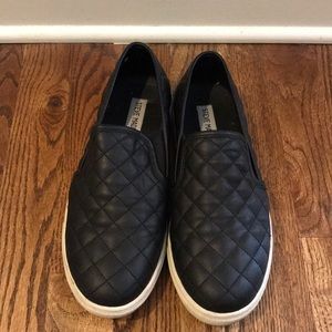 Black Steve Madden slip ons
